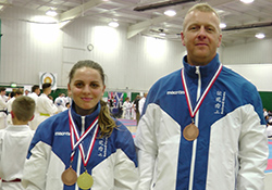 Ian and Nicole with their medals