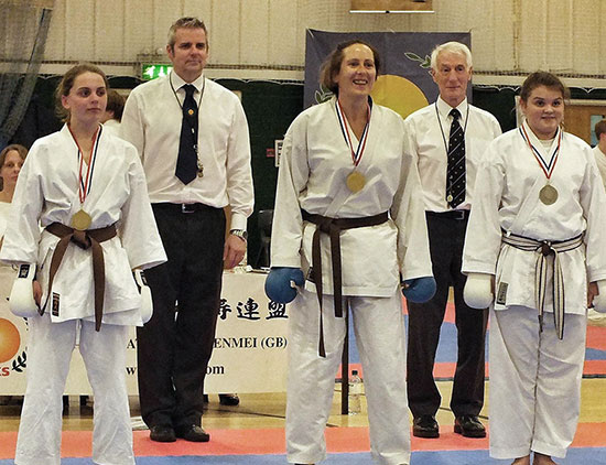 Nicole, seen here picking up bronze in the brown belt senior female kumite, November 2013